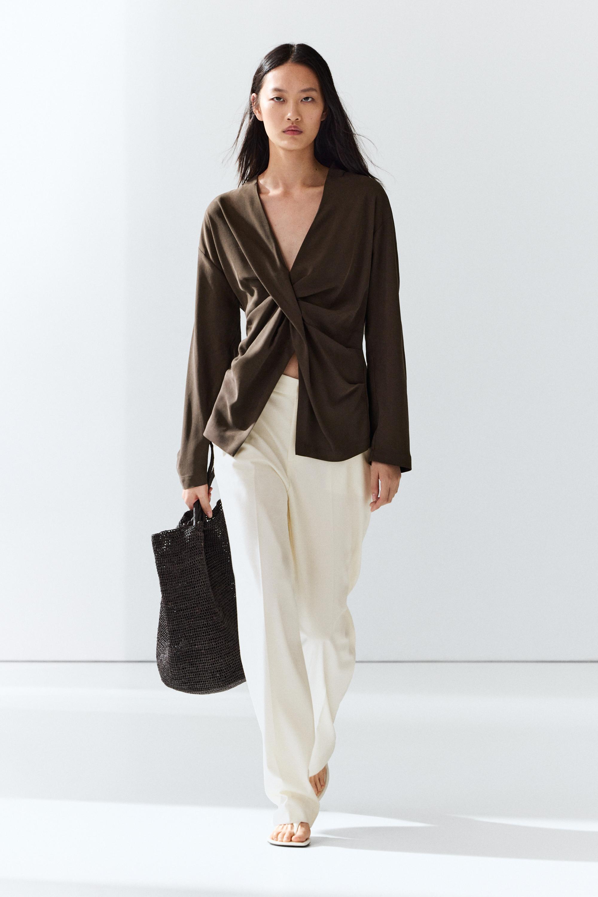 Flowing blouse with draped detail