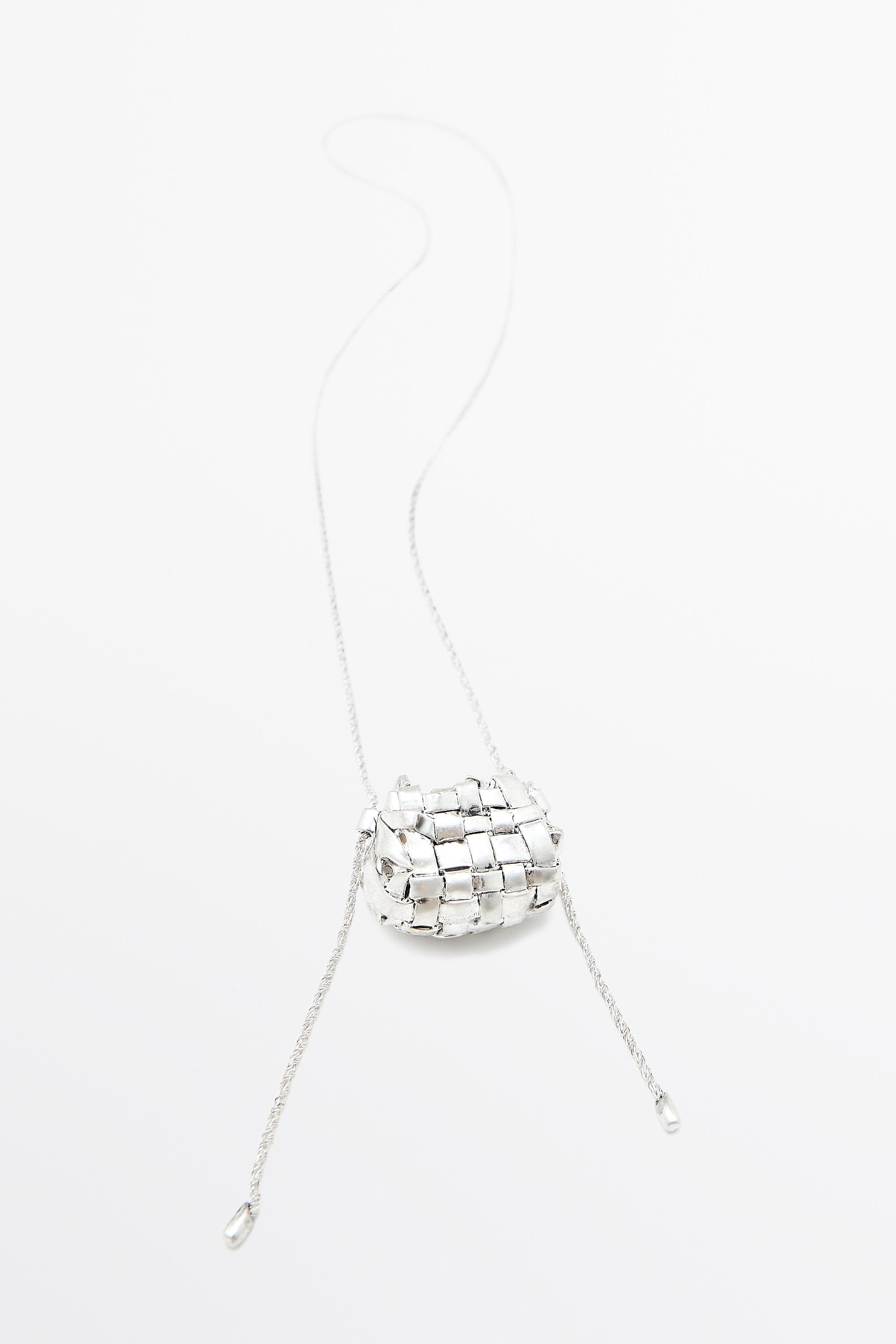 Collier long pièce panier