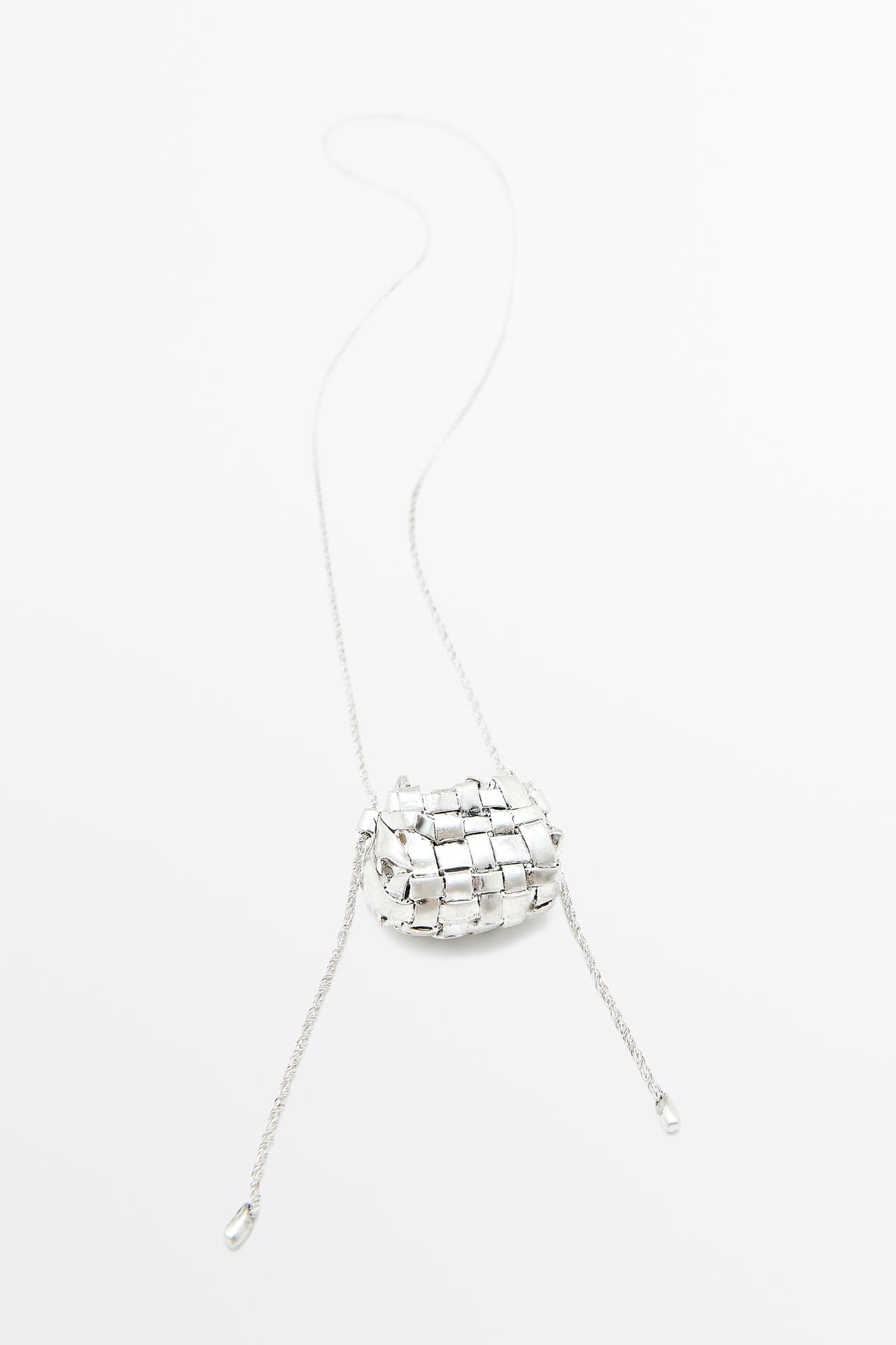 Long necklace with basket piece — Silver