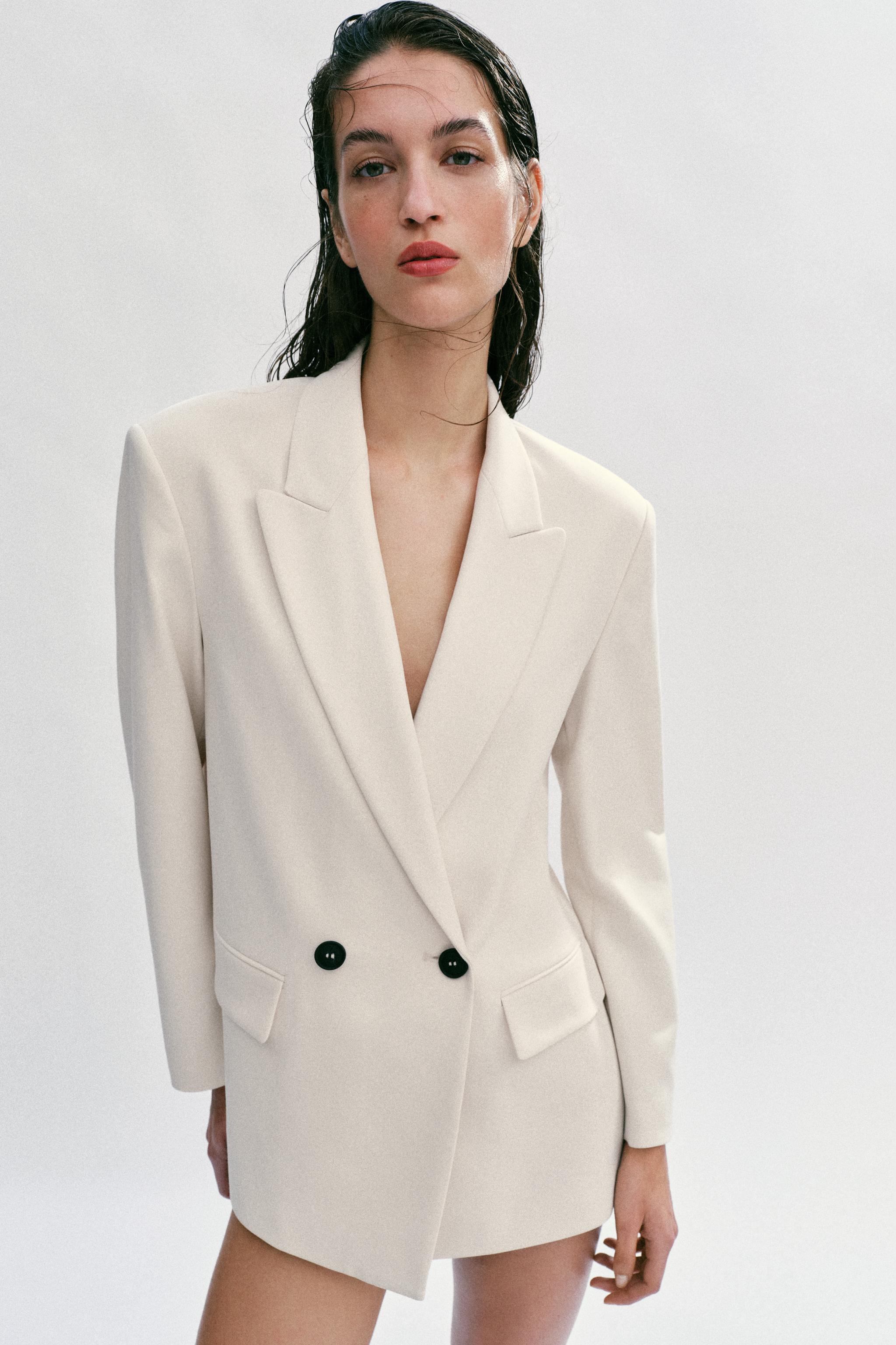 VESTE OVERSIZE À BOUTONNAGE CROIS
