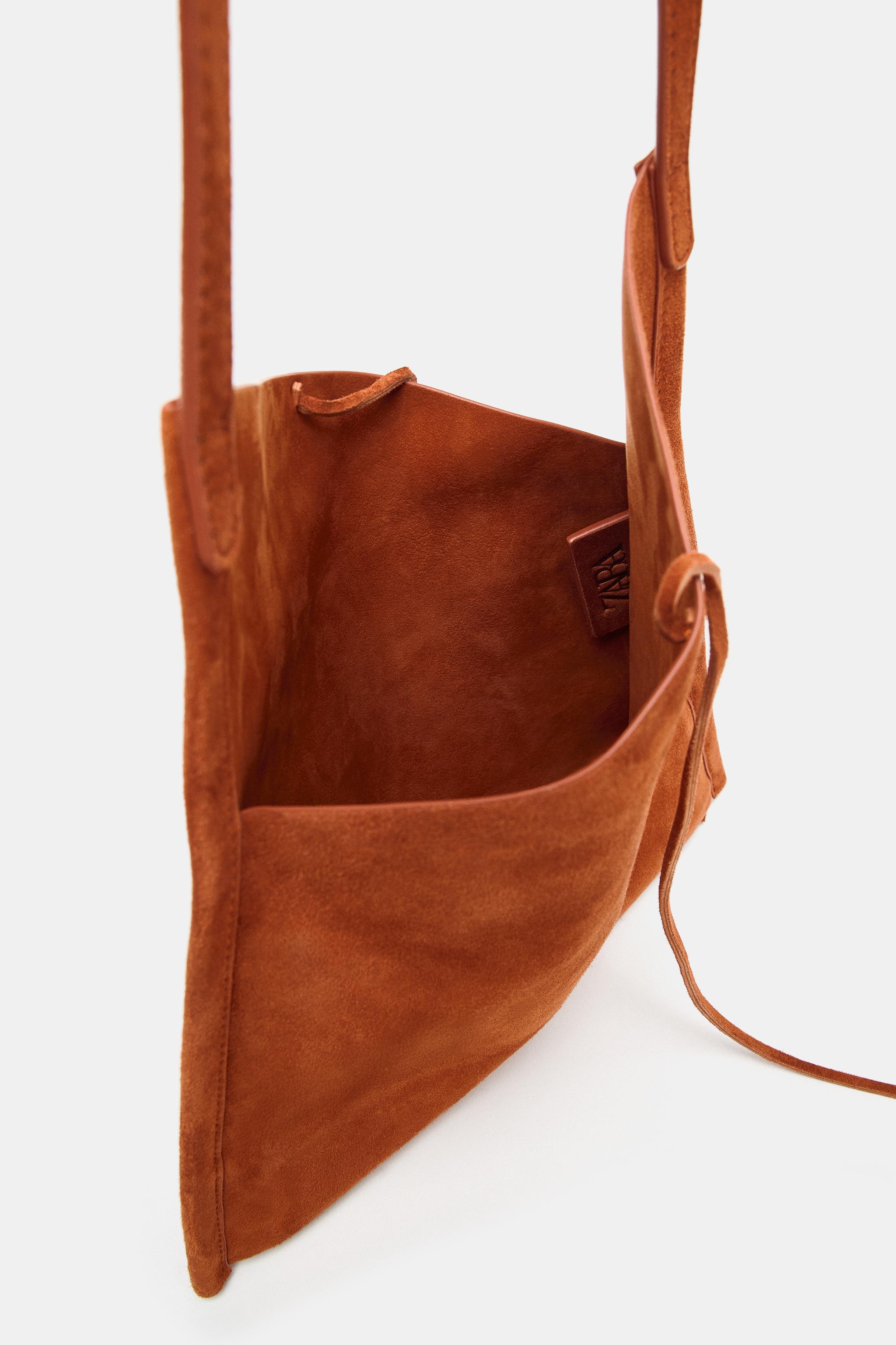 MINI SAC PLAT EN CUIR À NŒUD