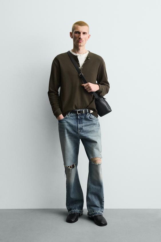 FLARE FIT RIPPED JEANS