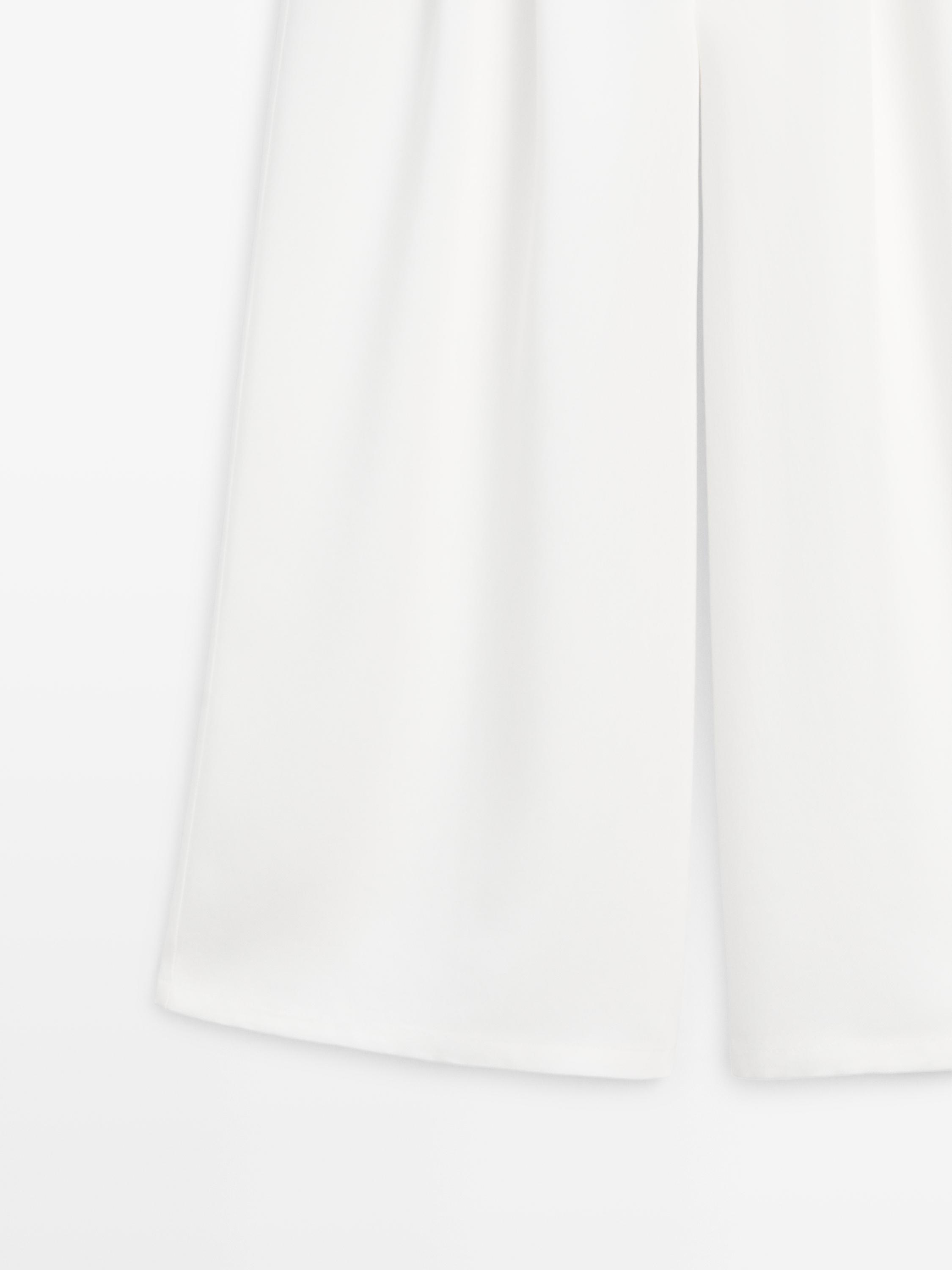 Pantalon wide leg à plis