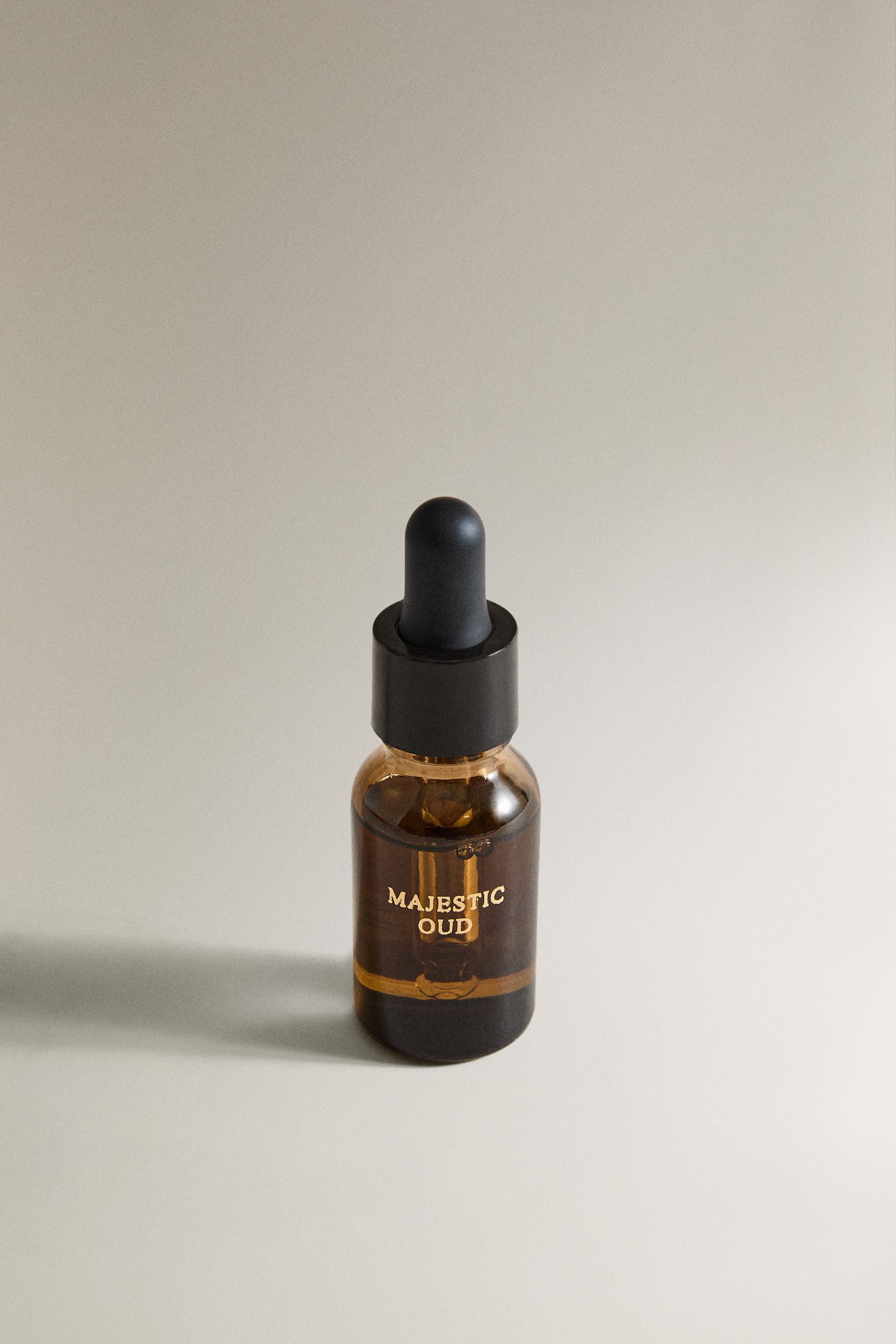 (15 ML) MAJESTIC OUD ESSENTIAL OIL — Dark brown