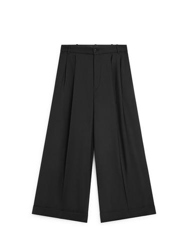 Pantalon fluide à pinces - Noir de Zara