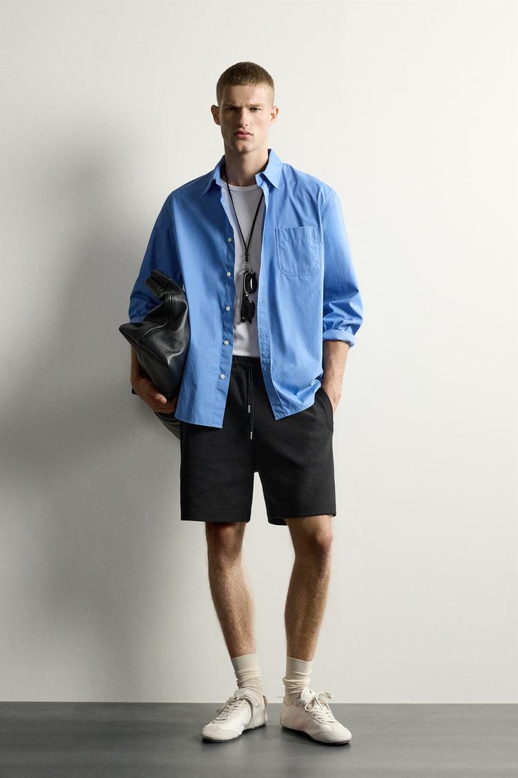 RELAXED FIT INTERLOCK JOGGING BERMUDA SHORTS
