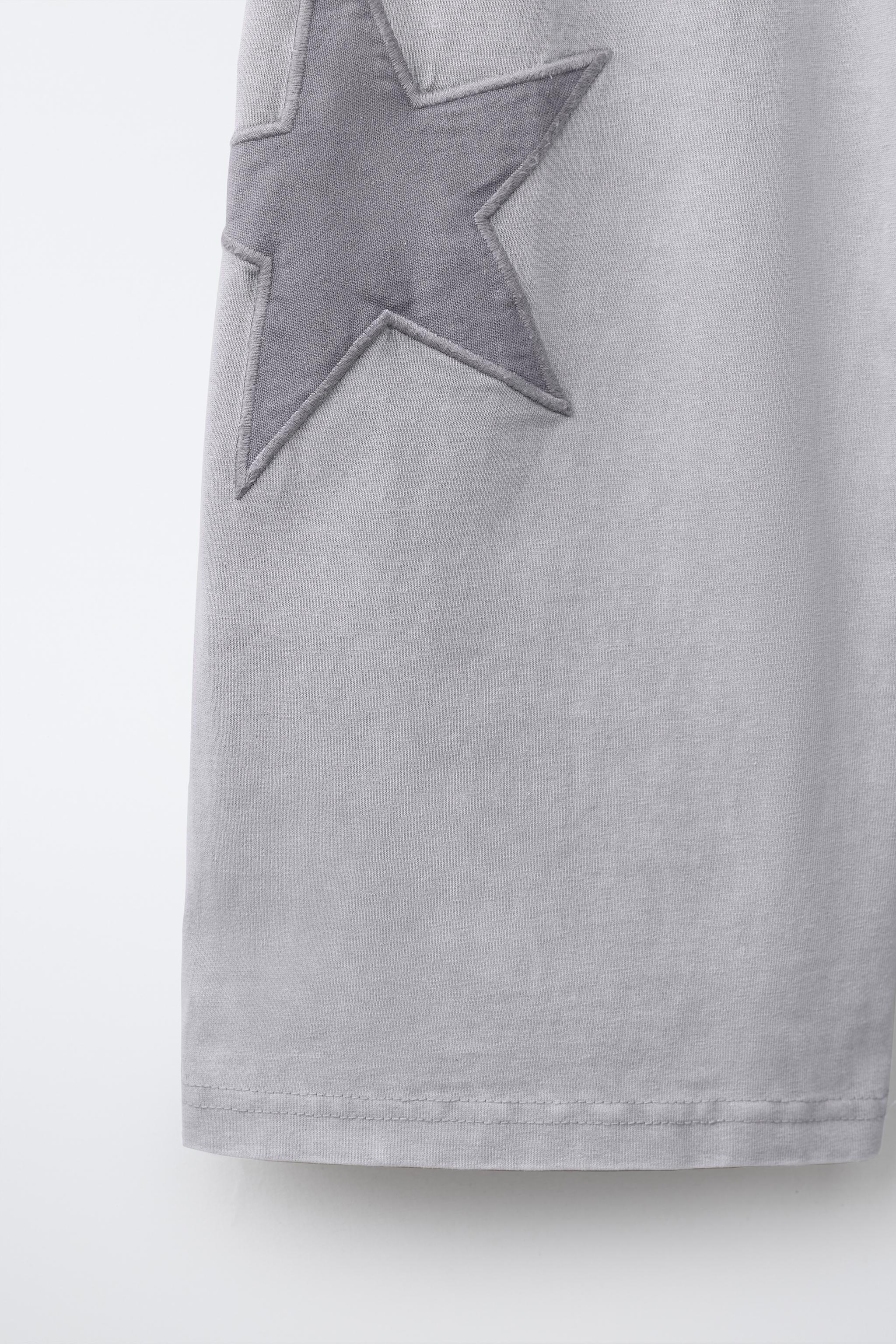 WASHED EFFECT STAR WIDE LEG PANTS