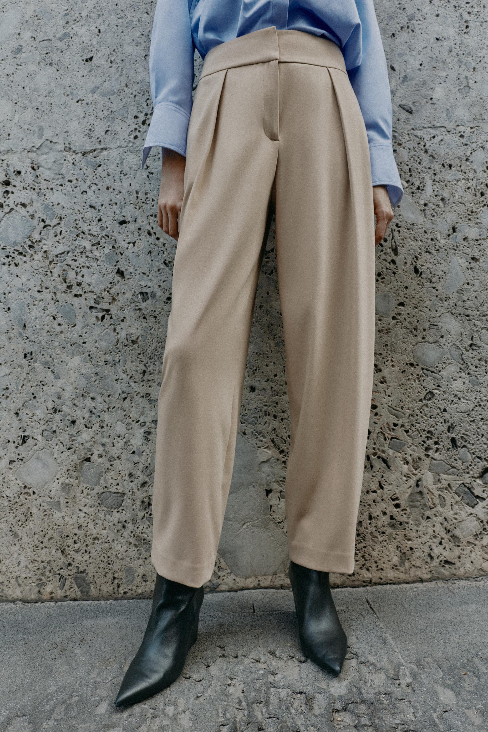 PLEATED CARROT TROUSERS