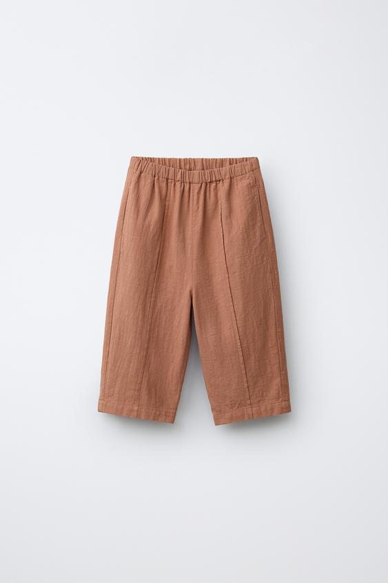 PANTALÓN BAGGY RÚSTICO - Teja de Zara - Imagen 0