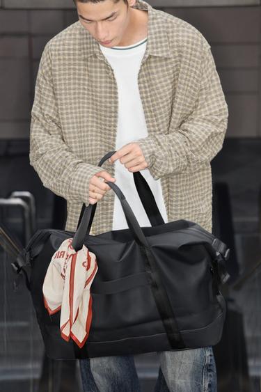 RUBBERISED TRAVEL BAG - Black by Zara