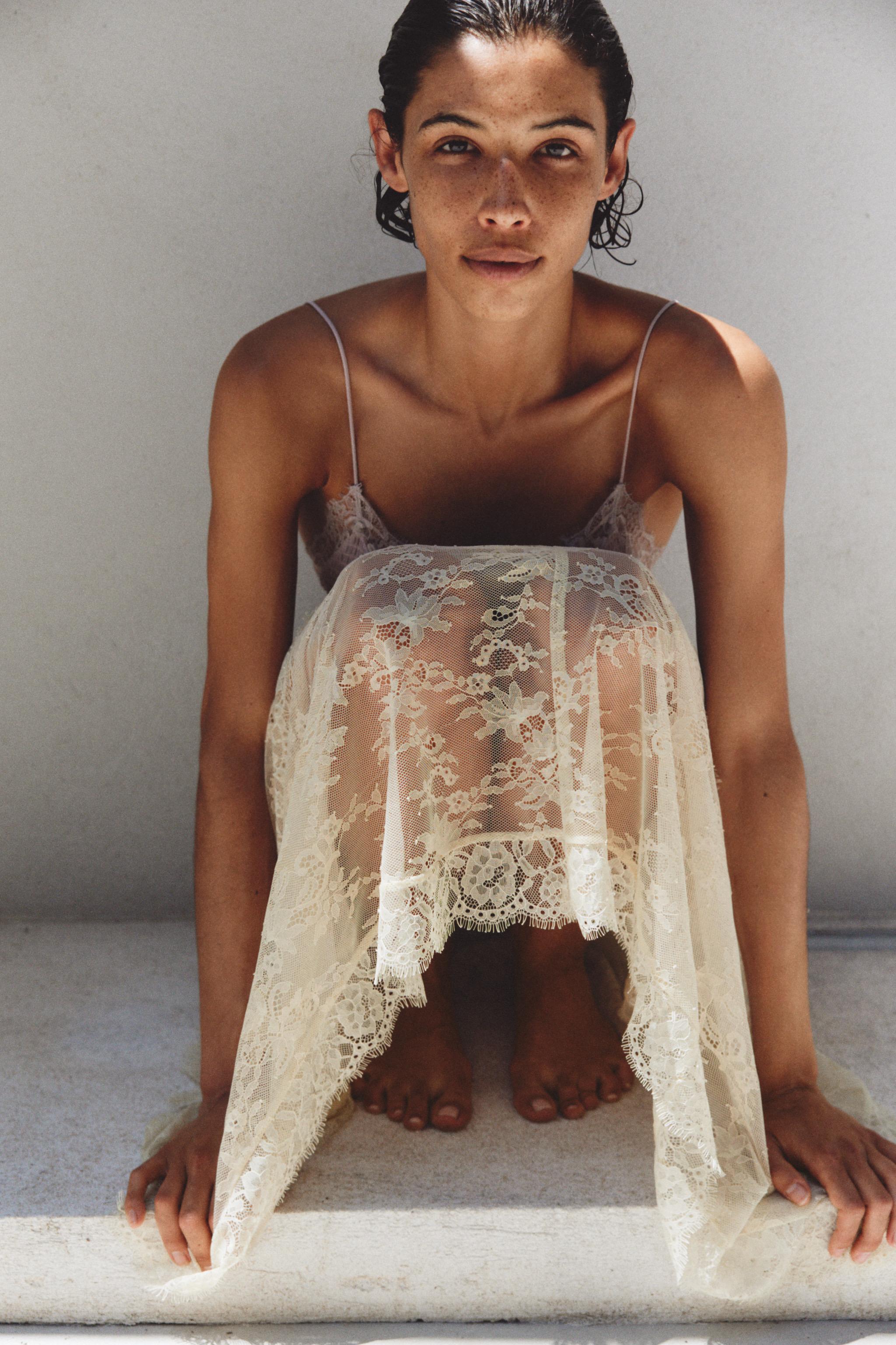 ASYMMETRIC LACE MIDI SKIRT