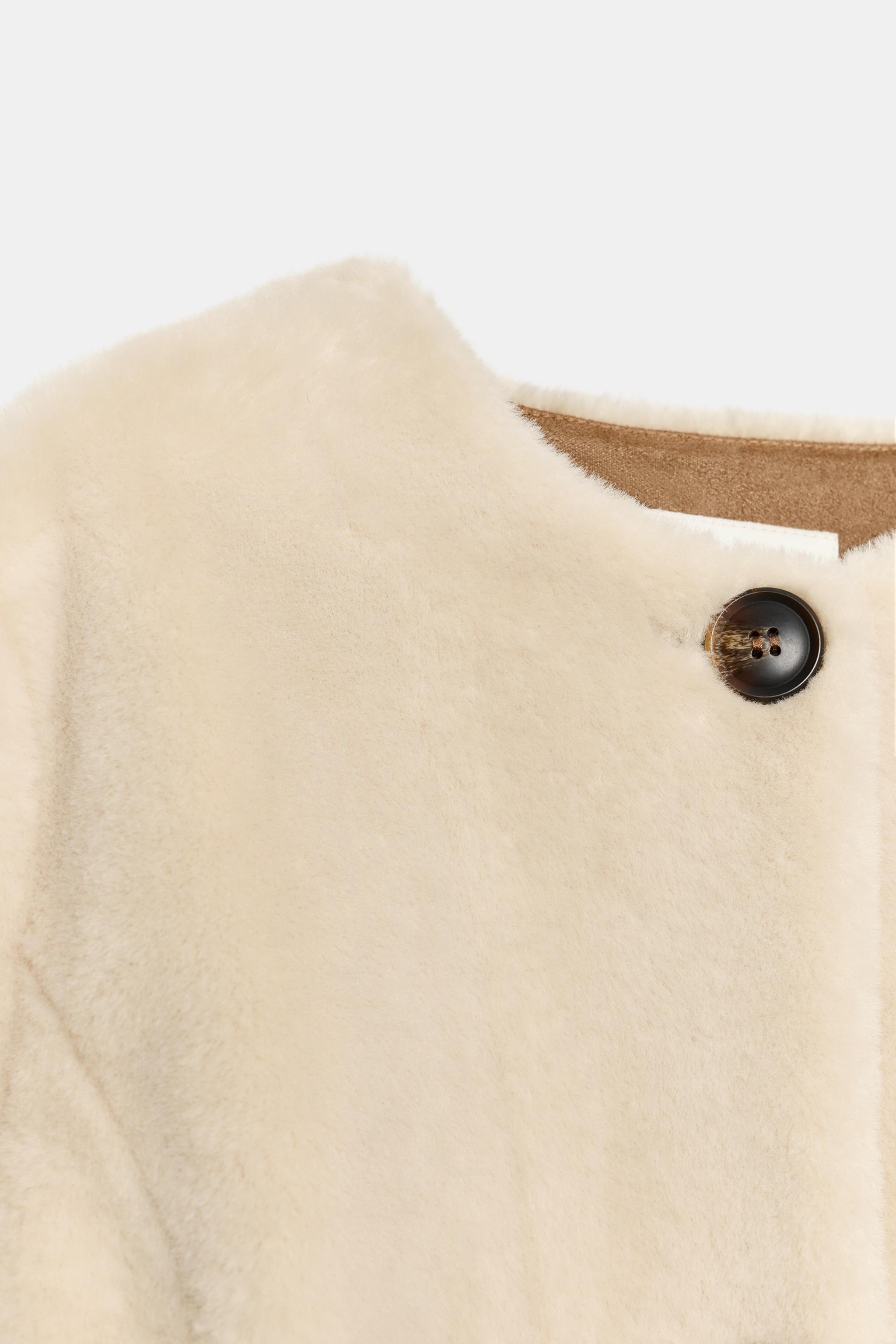 BLOUSON PEPLUM EFFET FOURRURE