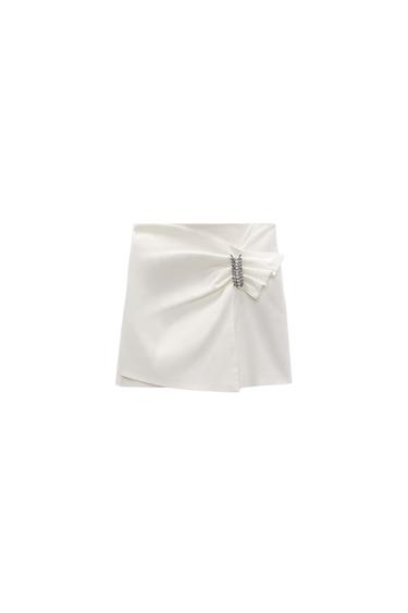 SHINY BUCKLED MINI SKIRT