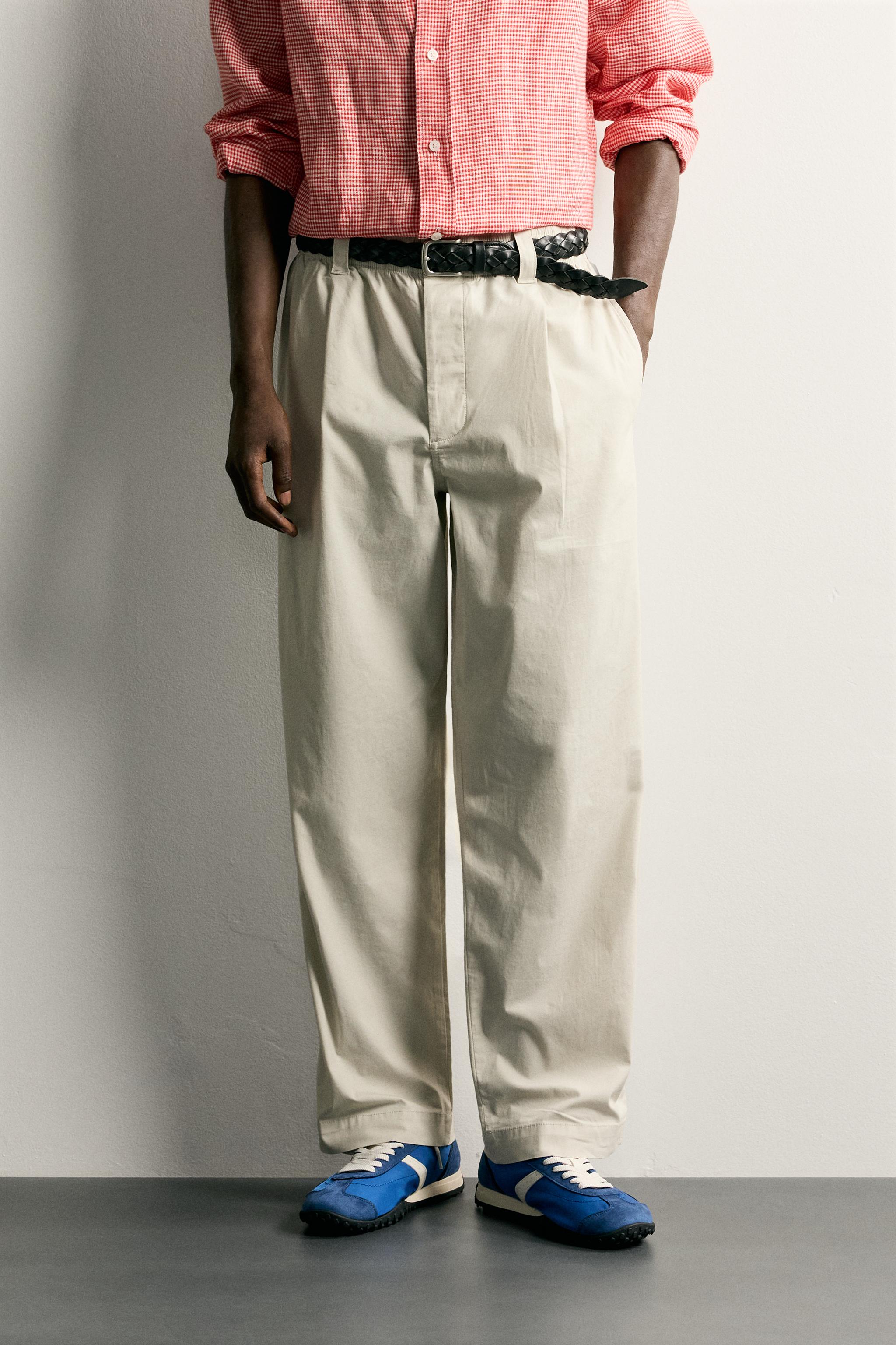 PLEATED RELAXED-FIT PANTS — Ecru