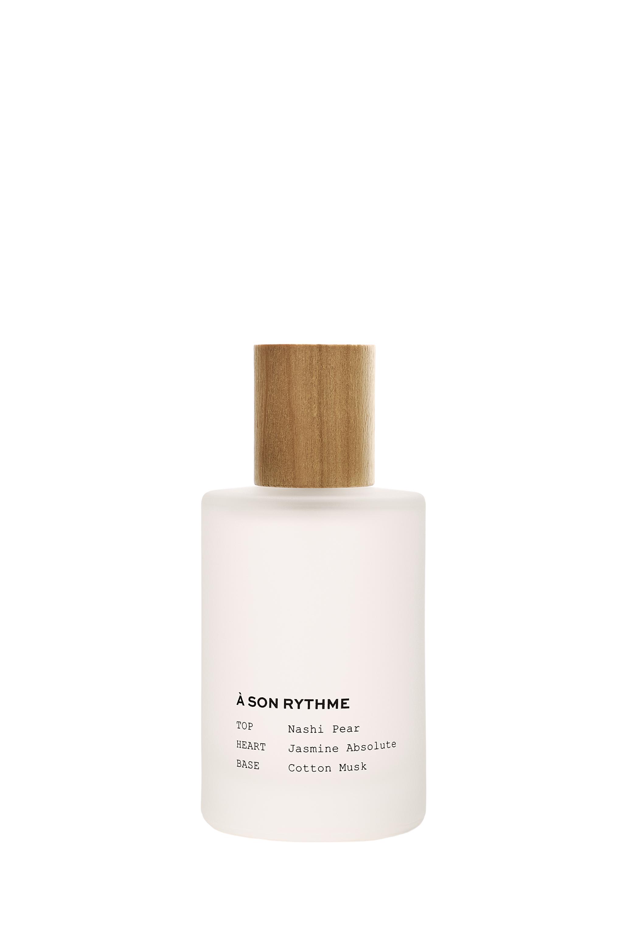 À SON RYTHME EDT 100ML (3.4 FL. OZ). — TINTED LEATHER