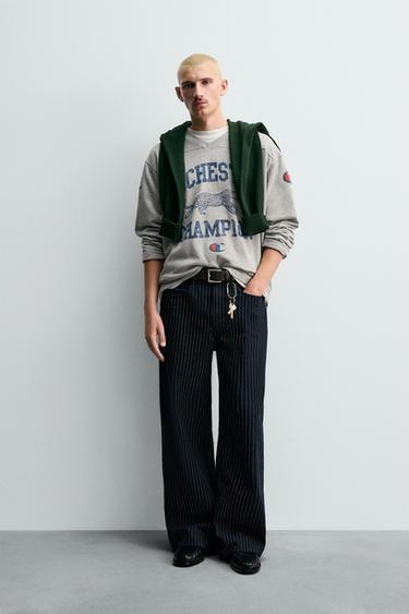 JEANS BAGGY FIT RAYAS CHAMPION ® X ZARA - Azul de Zara - Imagen 0