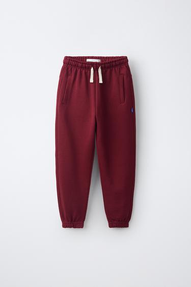 SOLID FLEECE JOGGERS WITH LABEL — Maroon 1