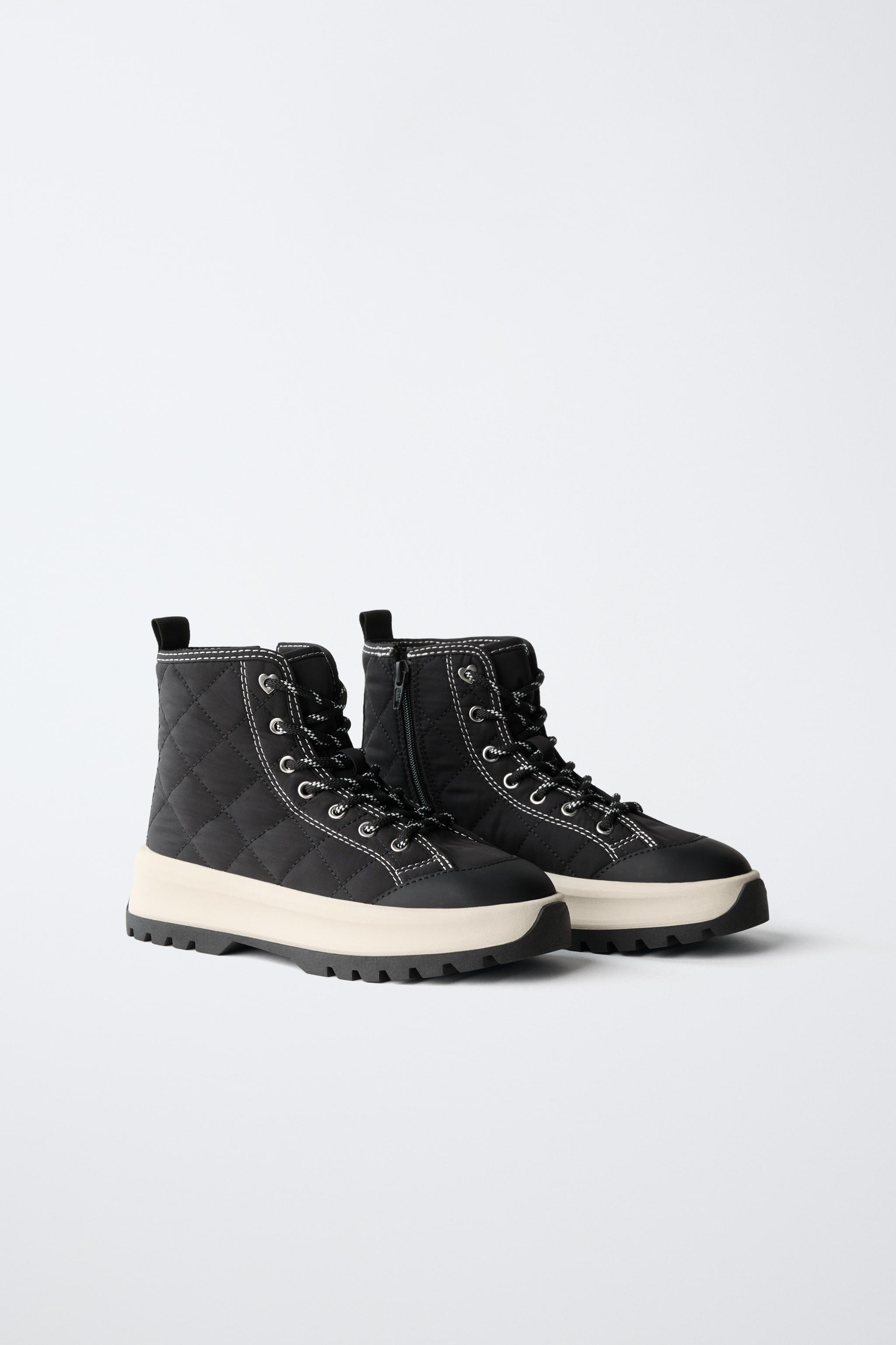 QUILTED HIGH-TOP SNEAKERS — Black