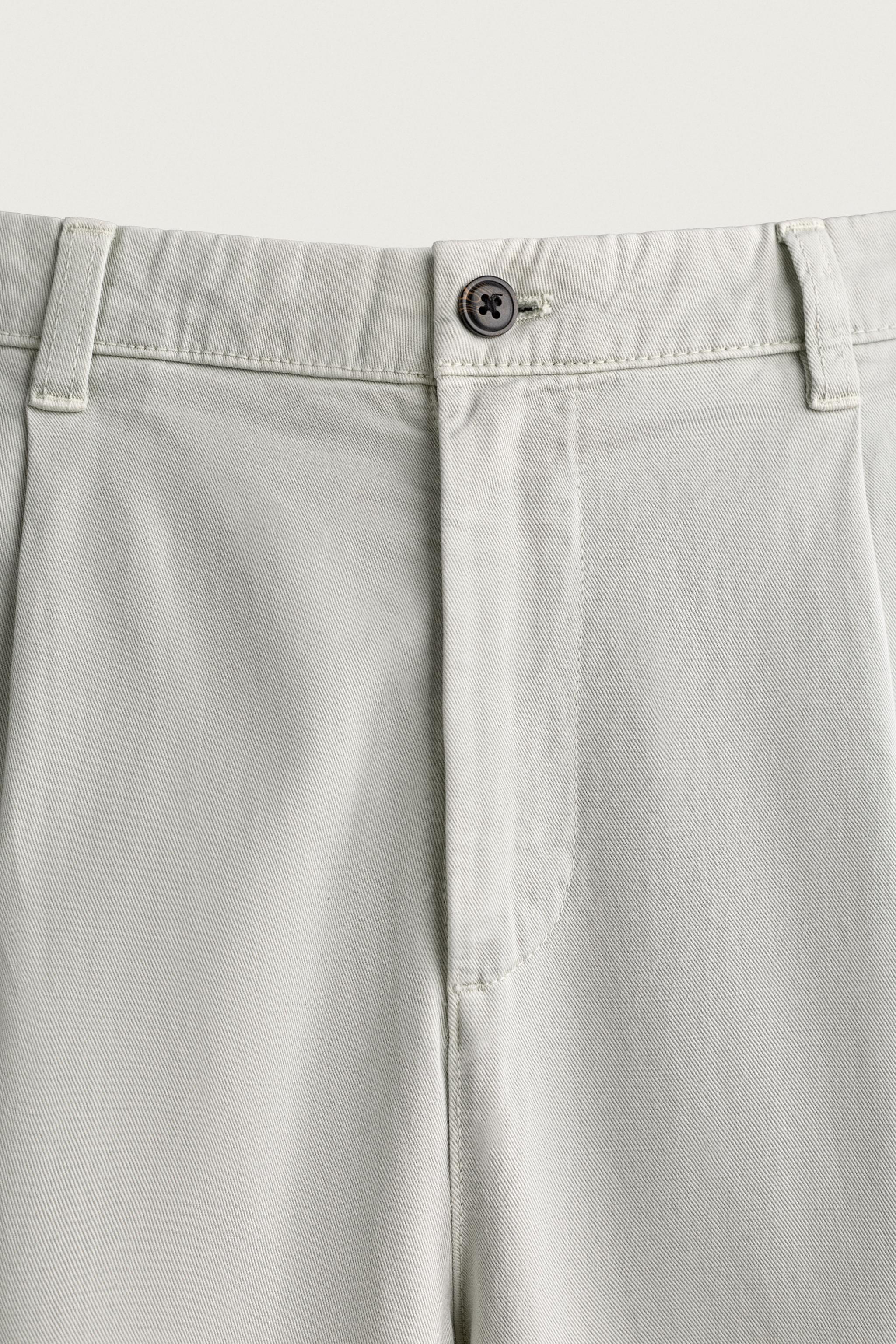 PLEATED STRAIGHT-FIT CHINO TROUSERS