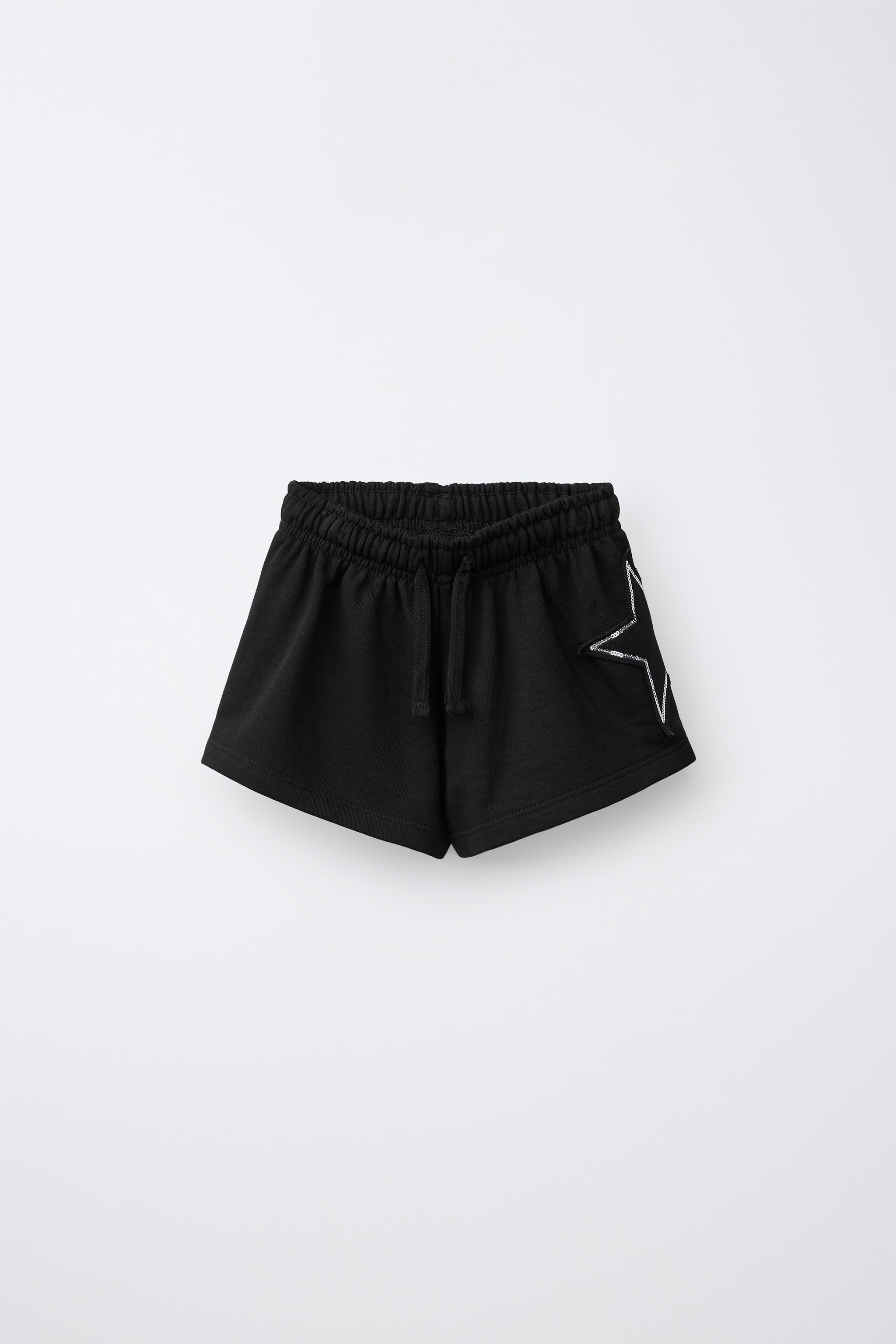 SEQUIN NUMBER PATCH SHORTS — Black