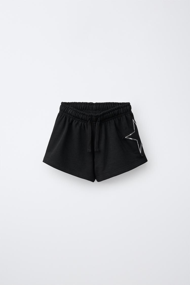 SEQUIN NUMBER PATCH SHORTS — Black
