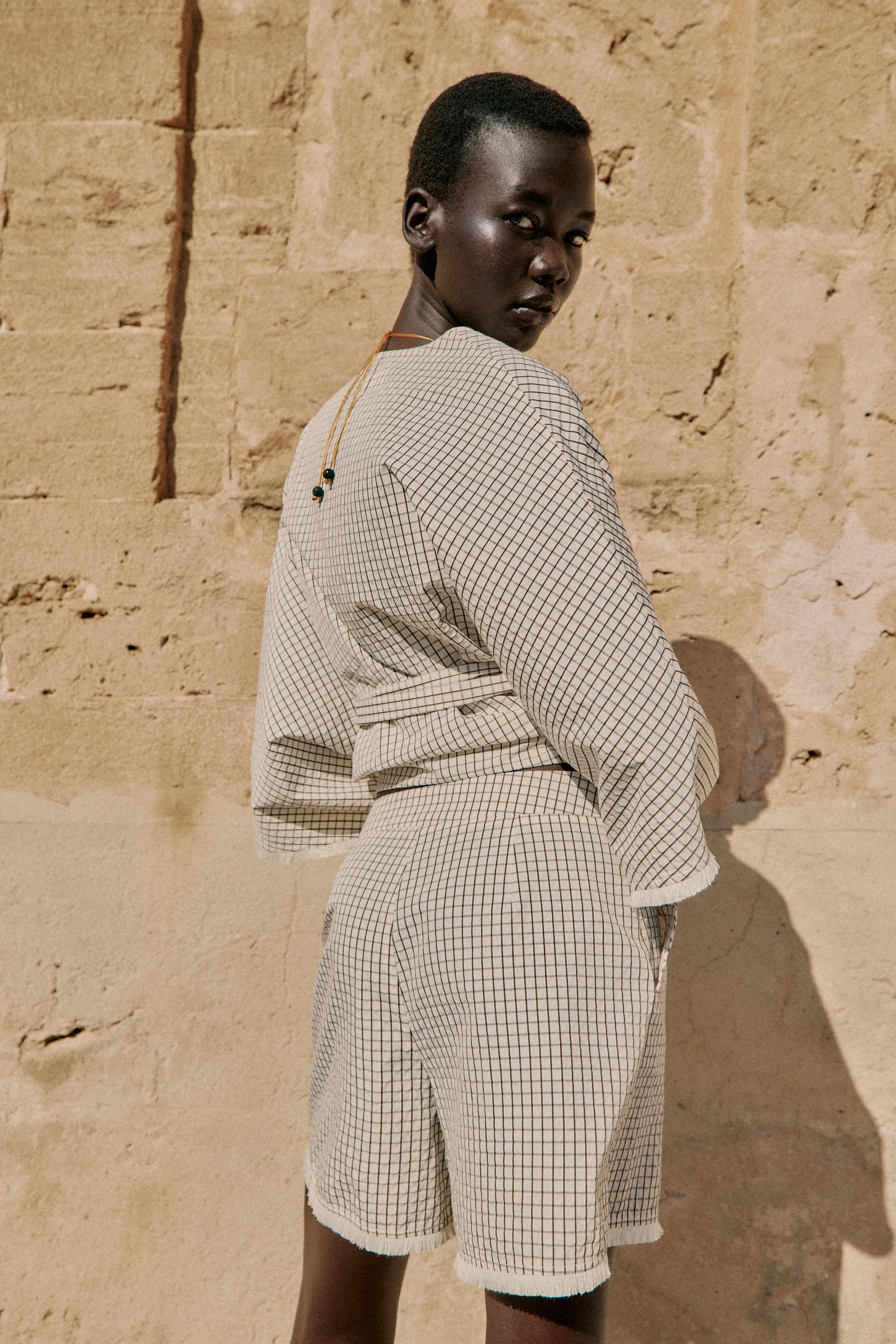 SHORT À CARREAUX EFFRANGÉ