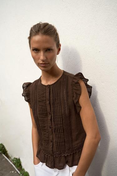 BLUSA ENTREDOSES OLANES - Marrón de Zara