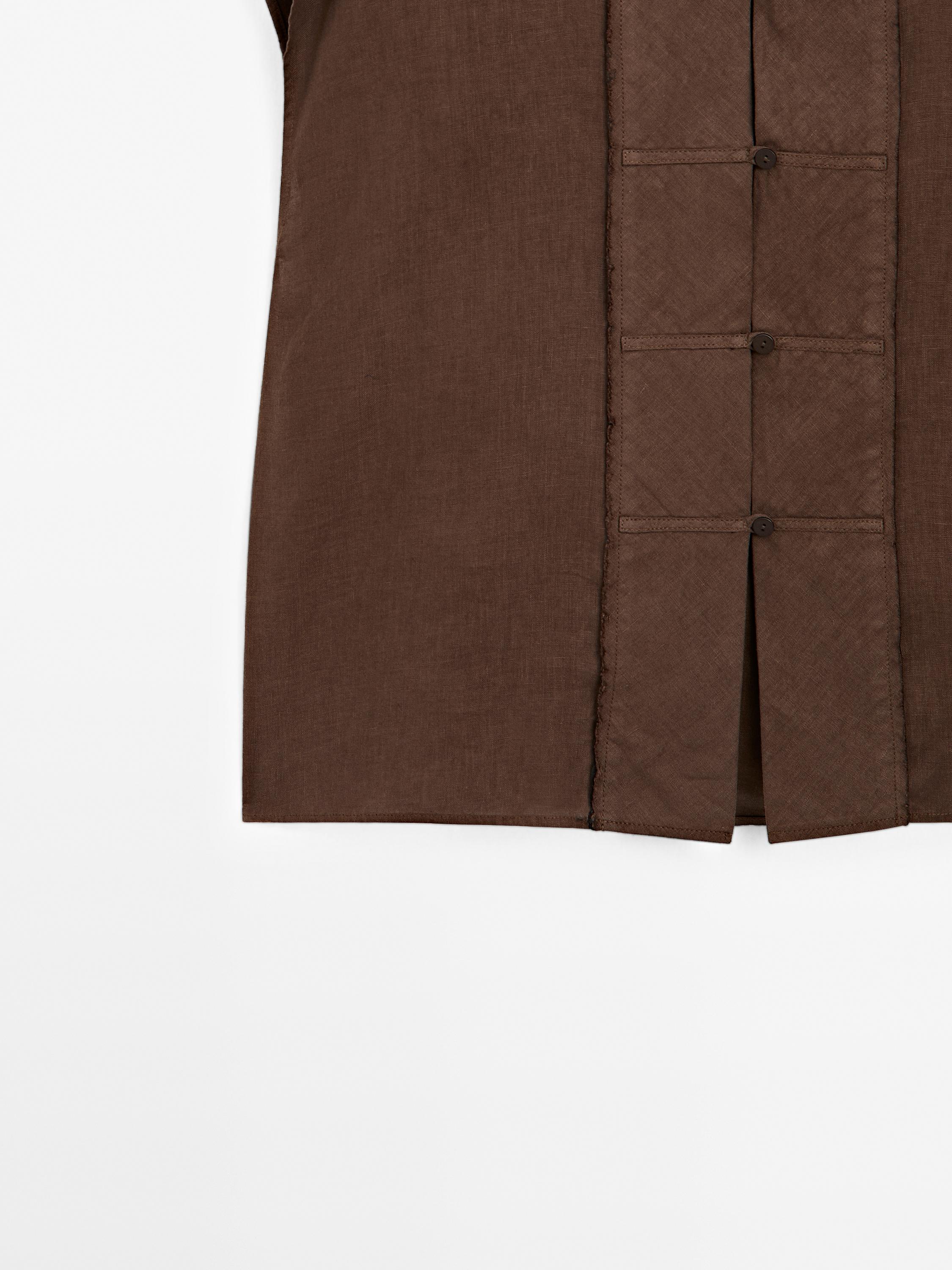 Waistcoat with buttoned chest detail