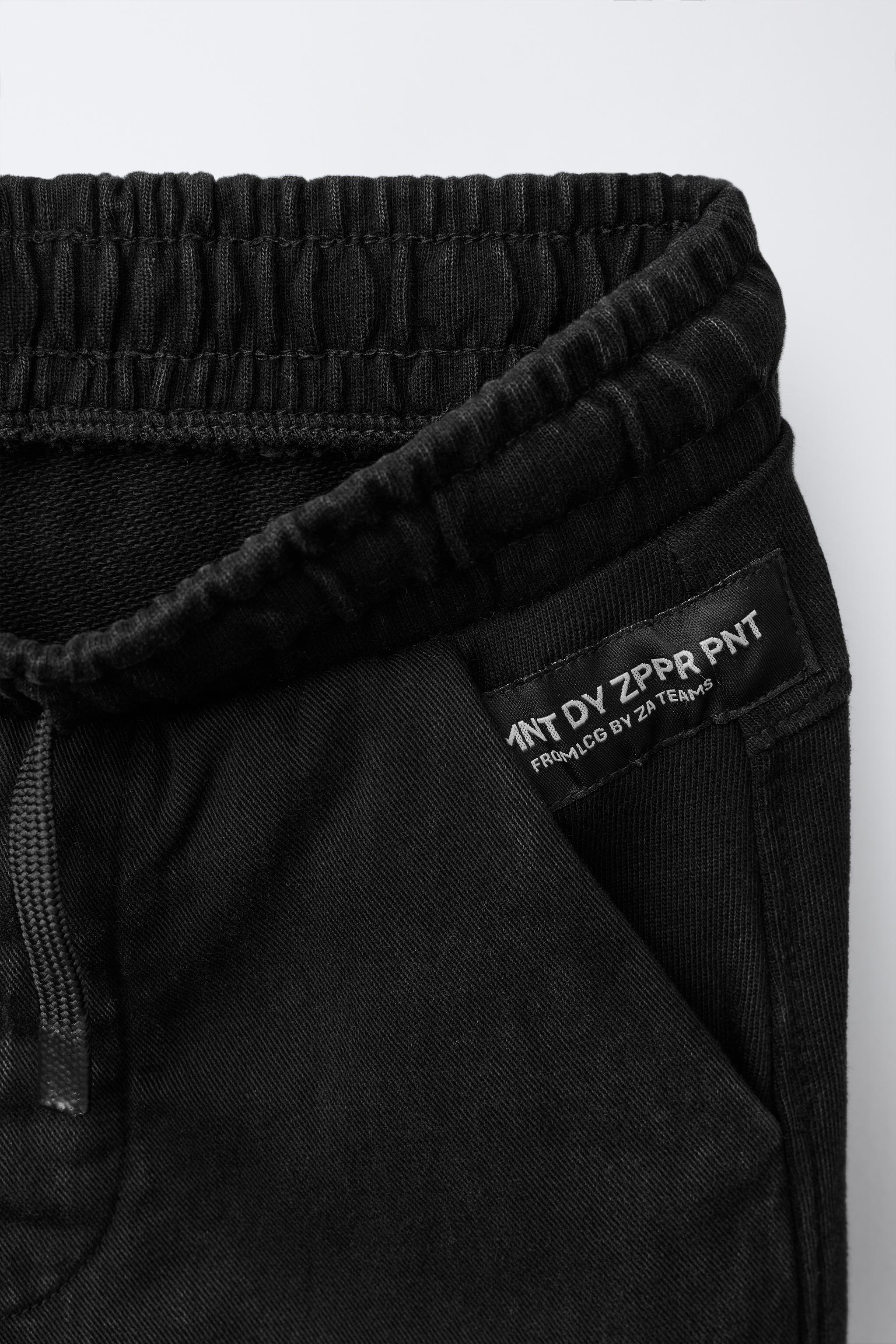 PANTALON JOGGER ZIPPÉ
