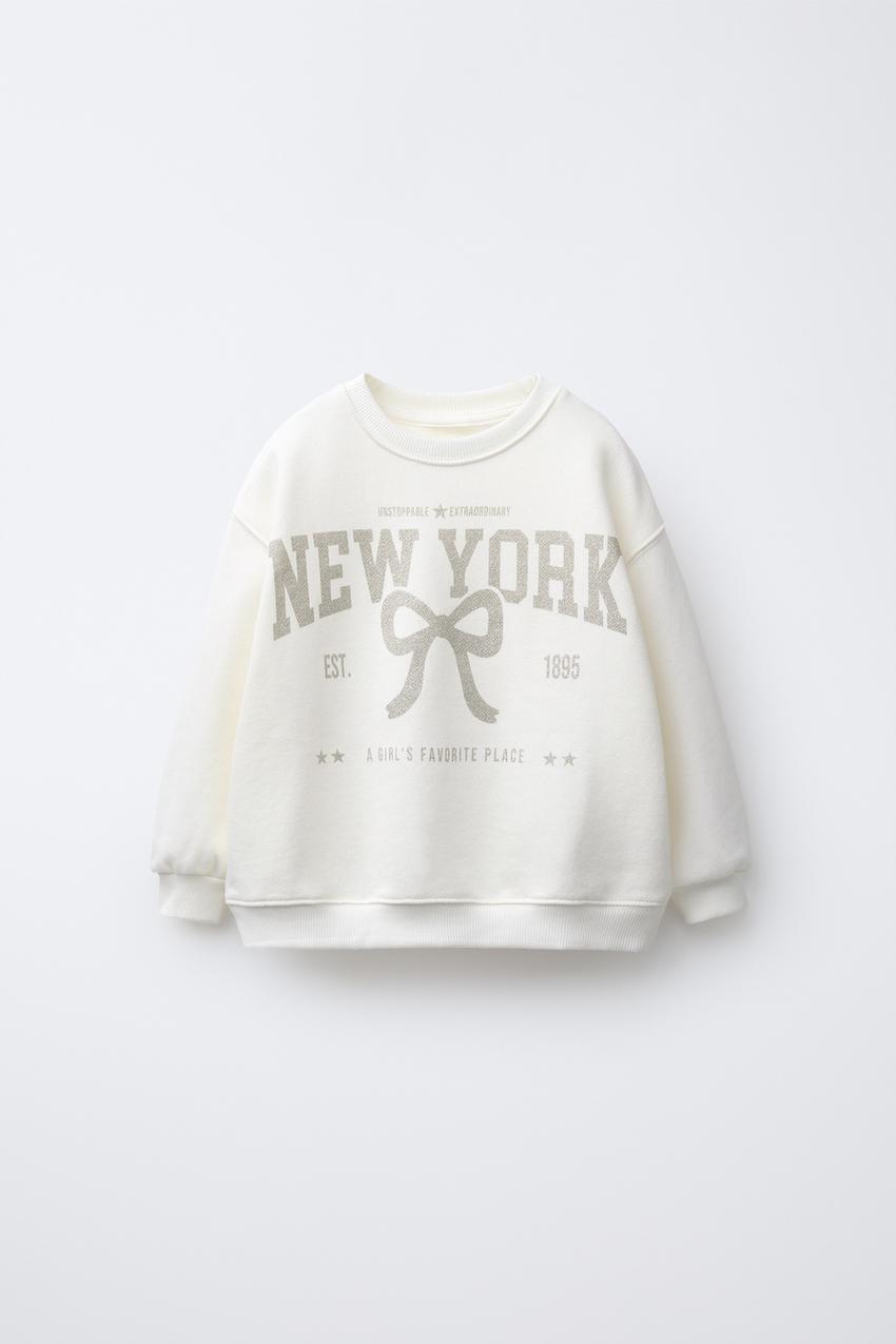 CITY GLITTER SWEATSHIRT
