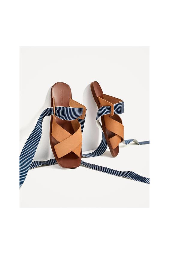 Imagem 1 de PALA PELE FITAS da Zara