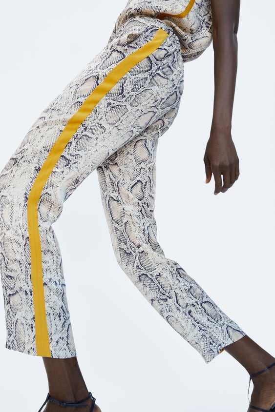 Image 2 of SNAKESKIN PRINT TROUSERS WITH SIDE TAPING from Zara