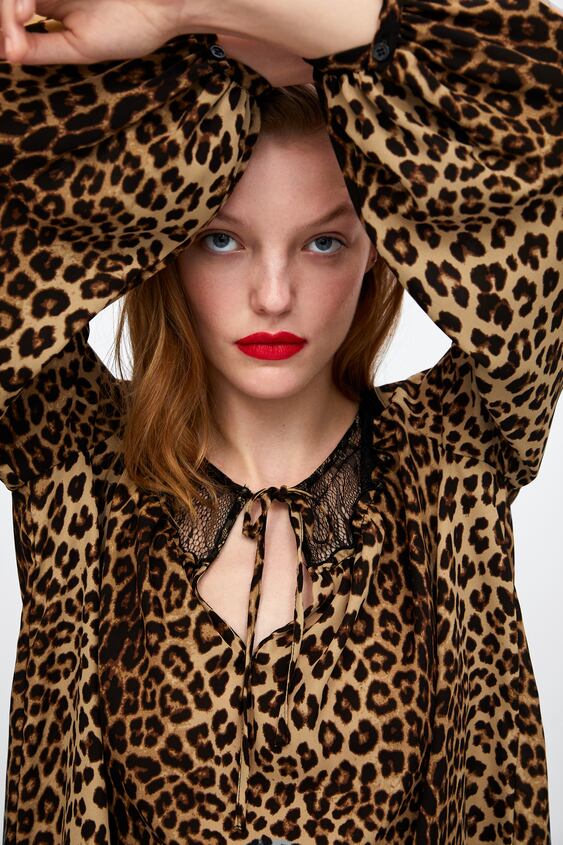 Image 2 of CONTRASTING ANIMAL PRINT TOP from Zara