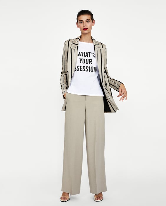 Image 1 of T-SHIRT WITH CONTRASTING SLOGAN from Zara