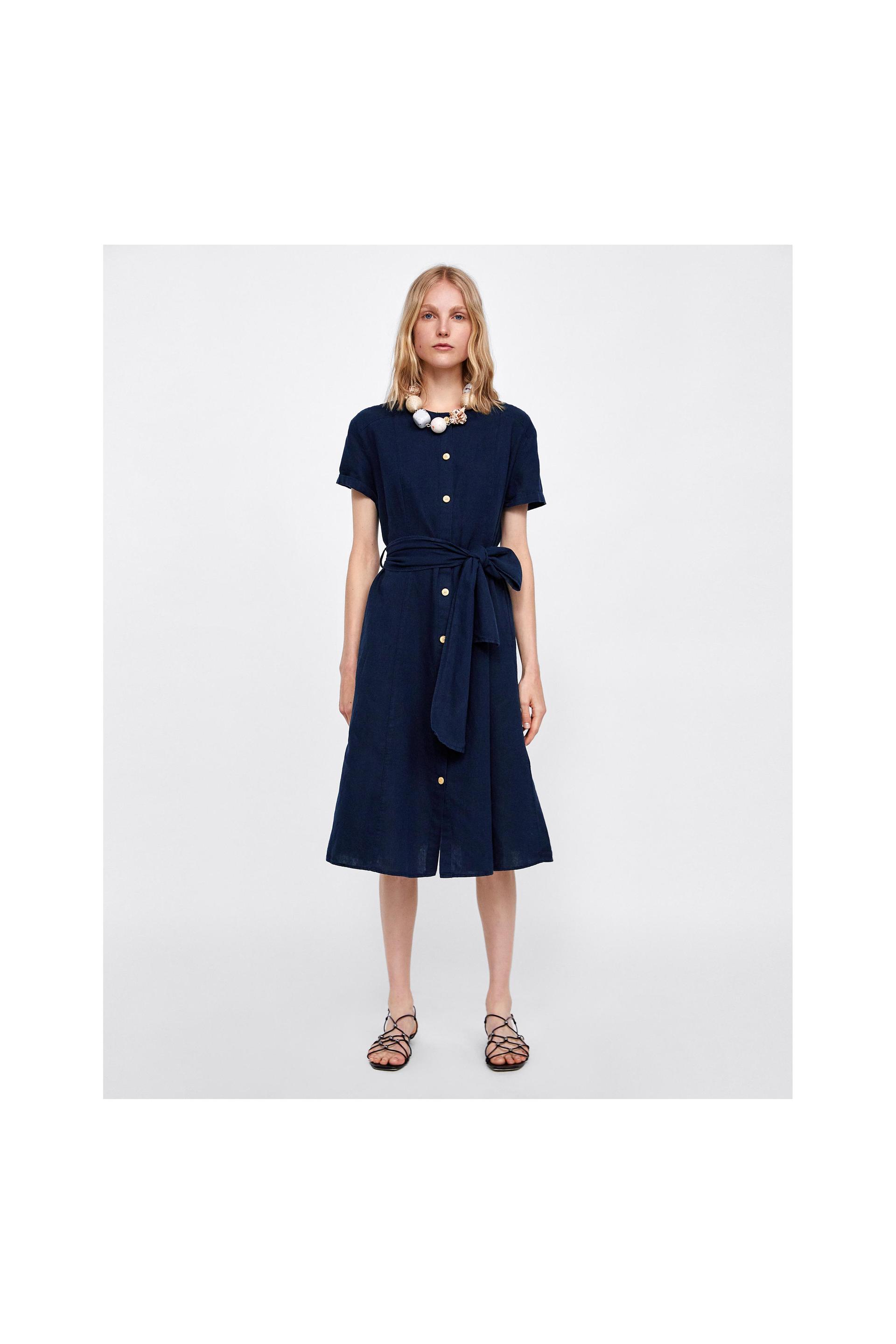 Image 1 of DRESS WITH BOW AND BUTTONS from Zara