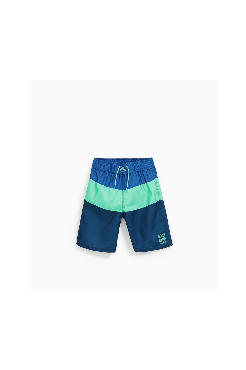 Imagem 1 de CALÃÃES BERMUDA DE BANHO COMPRIDOS ÃS RISCAS da Zara