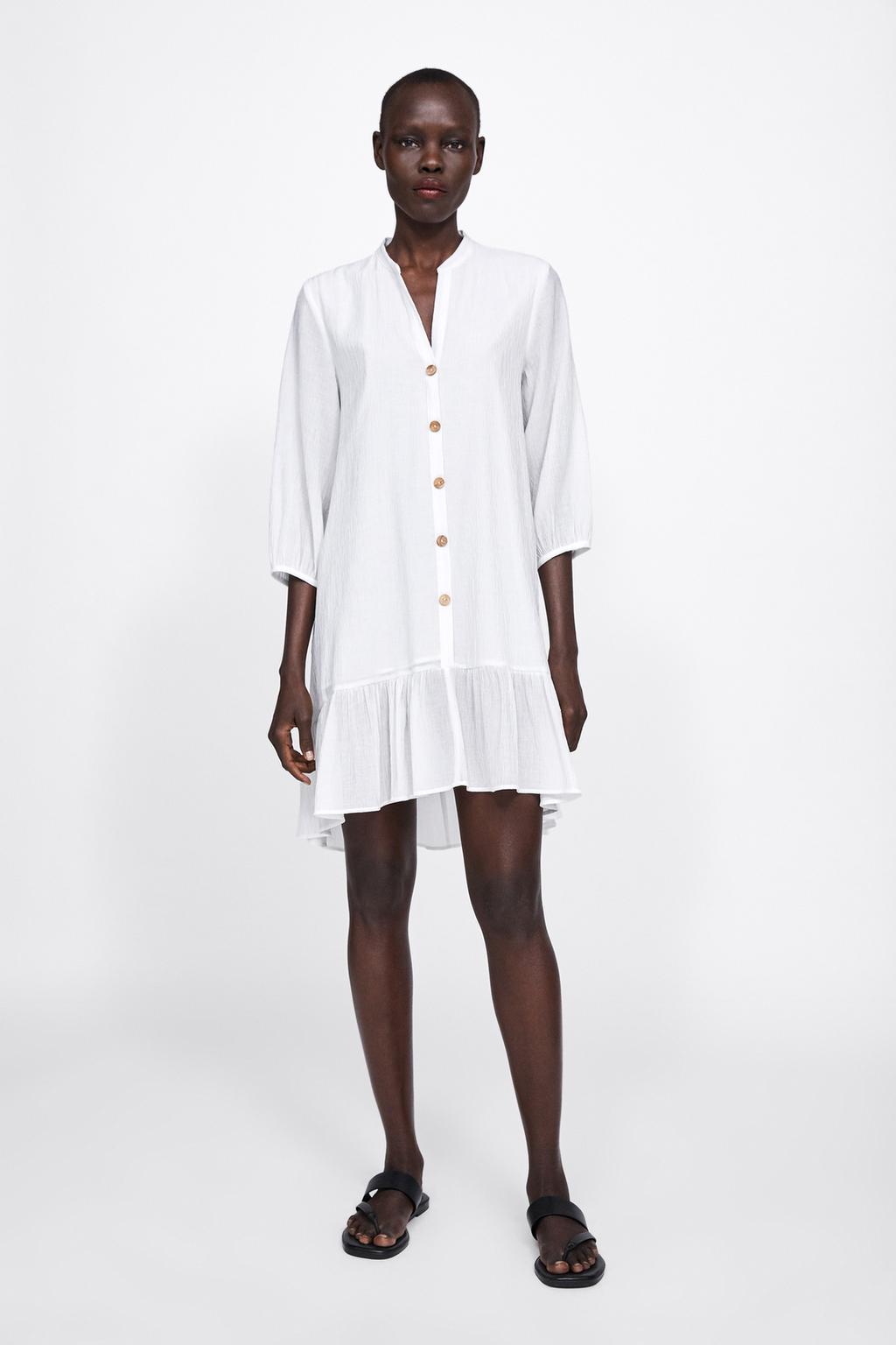 Immagine 1 di VESTITO TEXTURE CON VOLANT di Zara