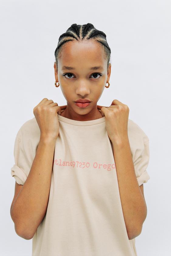 T-SHIRT WITH FRONT SLOGAN