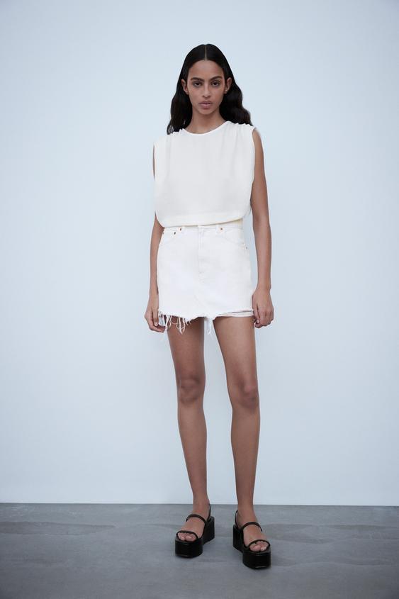 FALDA MINI DENIM ROTOS de Zara