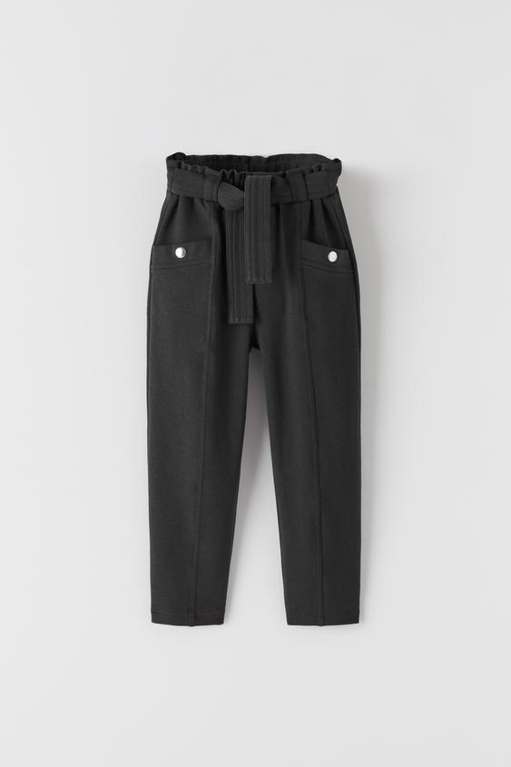 TROUSERS WITH SNAP BUTTONS