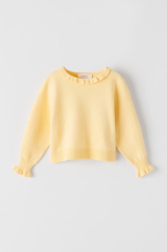 KNIT SWEATER WITH RUFFLE TRIMS