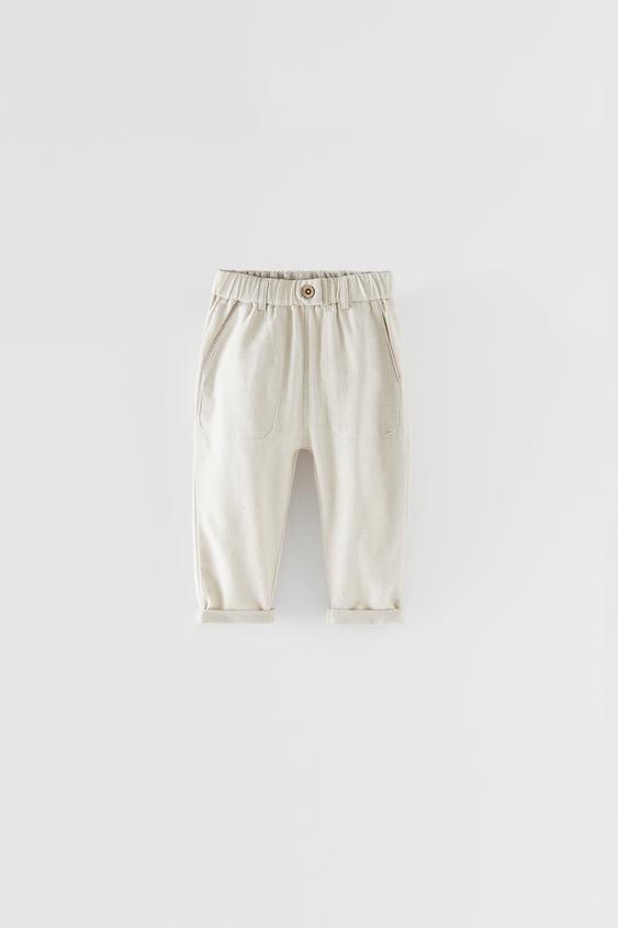 NATURAL LOOSE-FITTING TROUSERS