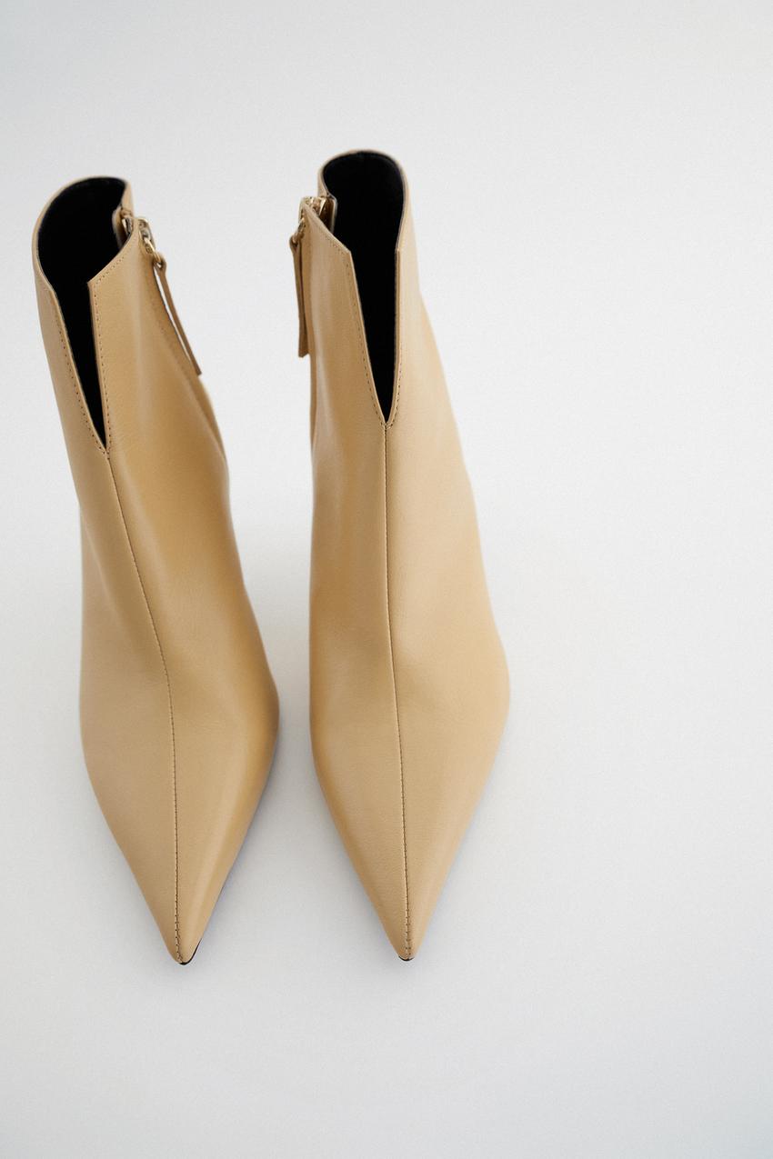 sivri burunlu ve topuklu deri bilekte bot