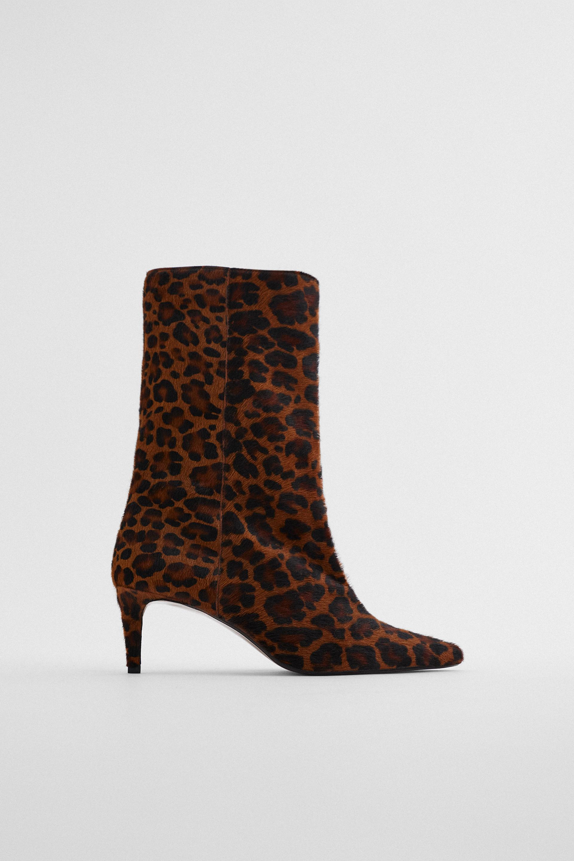 leopar desenli topuklu deri bilekte bot