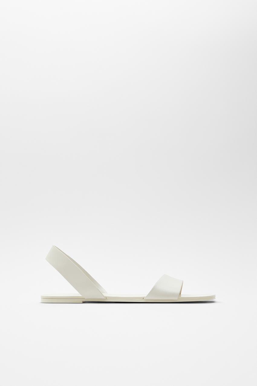 Por precio y estilo: las sandalias de Zara que arrasan en ventas 2 Merca2.es Imagen 1 de SANDALIA PLANA PIEL DESTALONADA de Zara