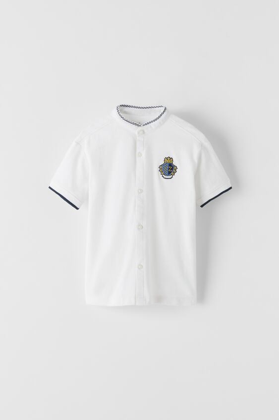 POLO SHIRT WITH CREST DETAIL