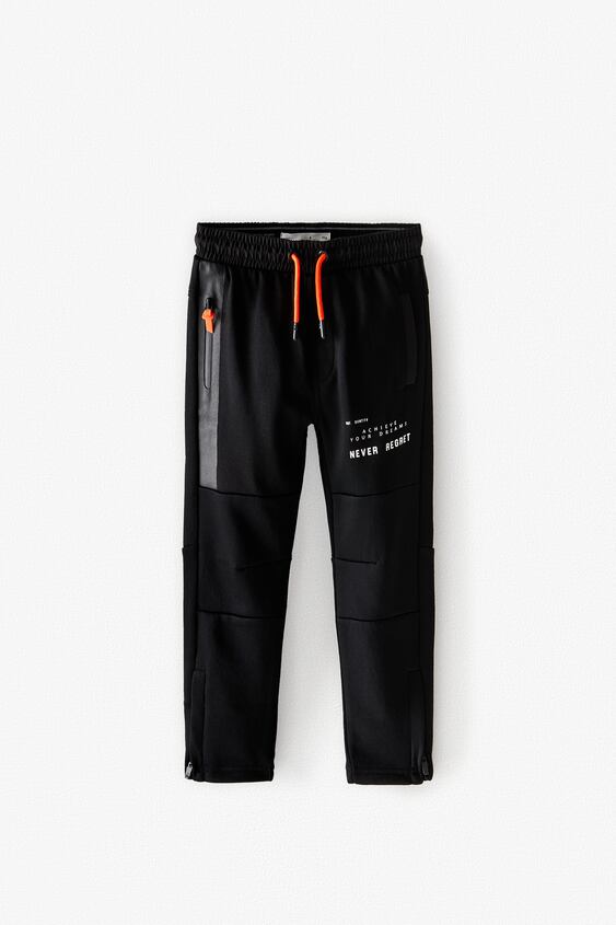 SPORTY TROUSERS WITH NEON DETAIL