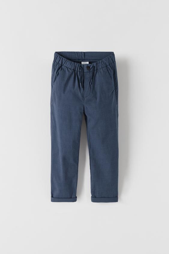 TROUSERS WITH BLURRED CHECK PRINT
