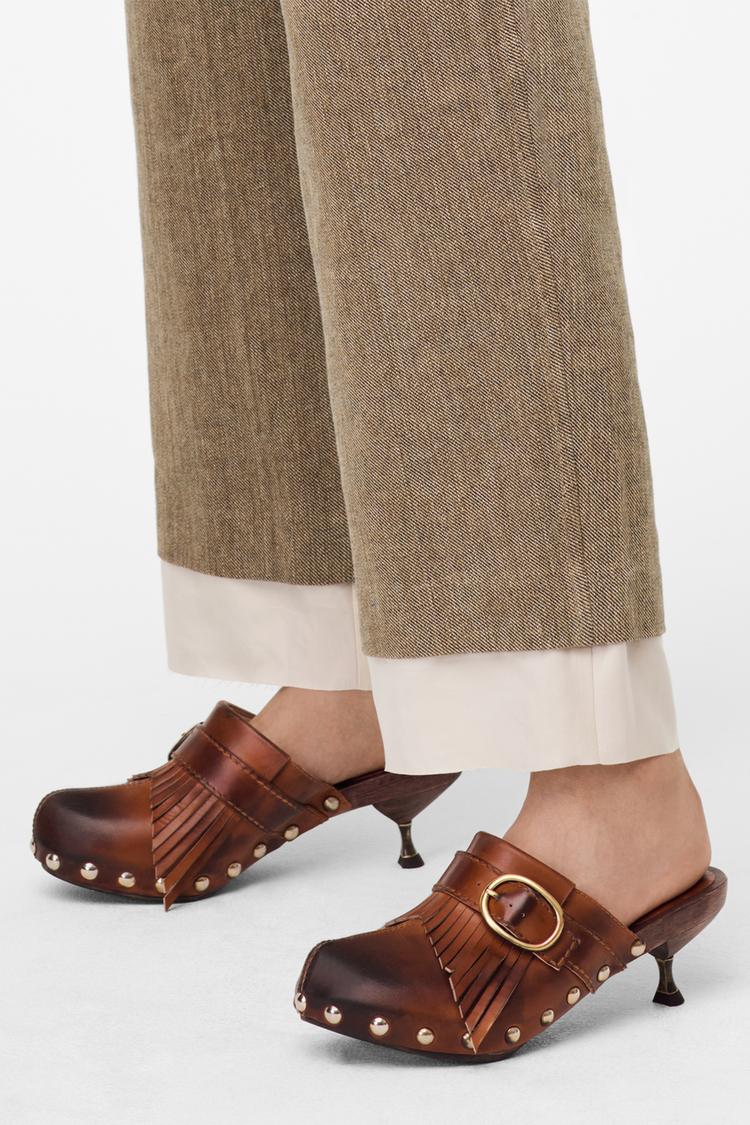 SOCAS PELE TACÃO MADEIRA FRANJAS