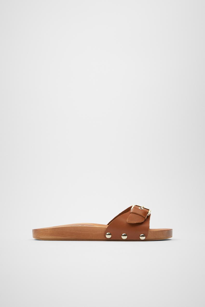 Por precio y estilo: las sandalias de Zara que arrasan en ventas 6 Merca2.es Imagen 1 de SANDALIA PLANA PIEL SUELA MADERA de Zara